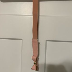 Pink stretchy bow belt